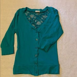Women’s teal button down shirt